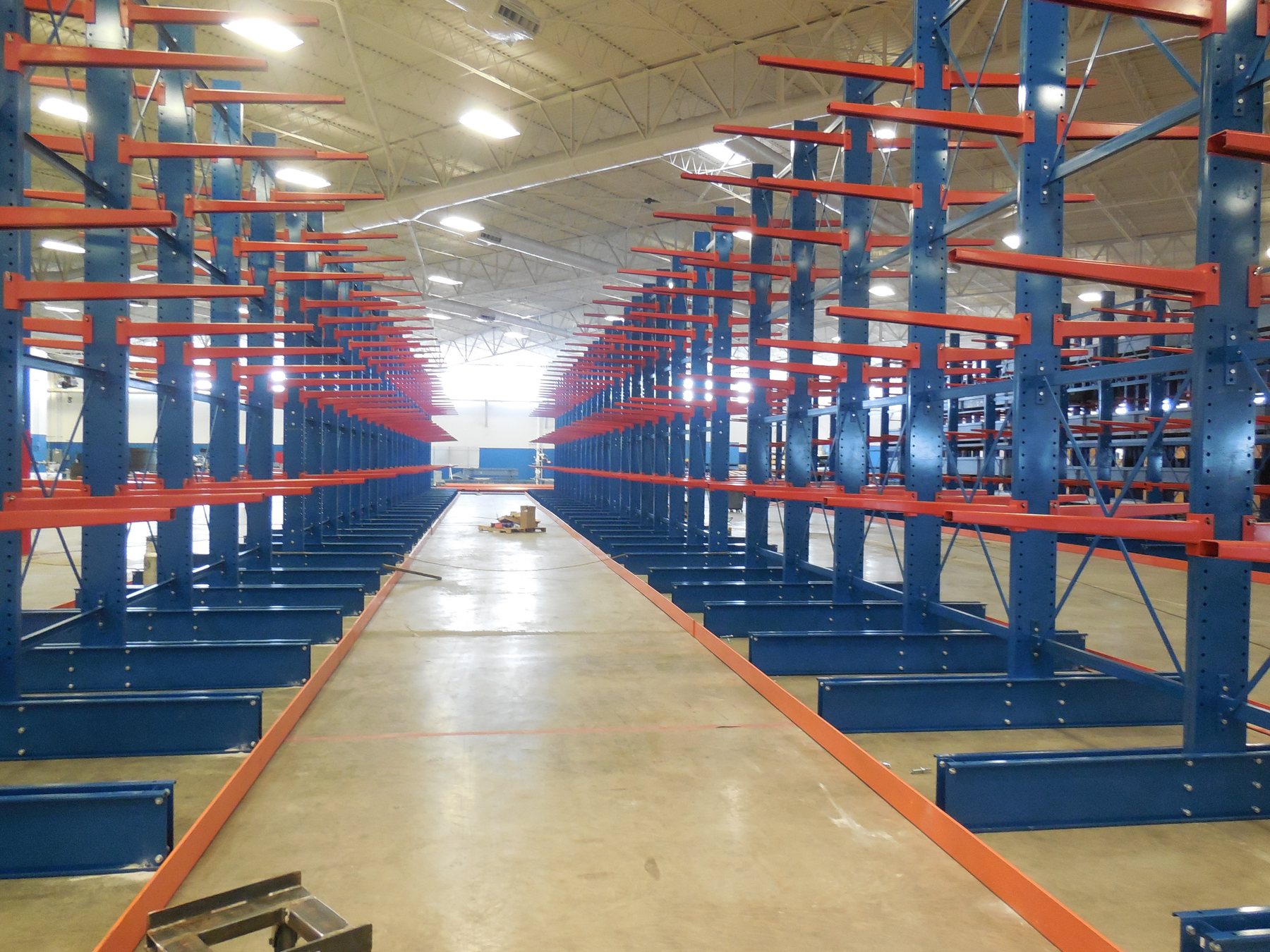 Long aisle through ATK cantilever storage rows