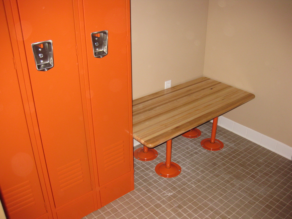 Orange Metro Logics lockers and locker room bench