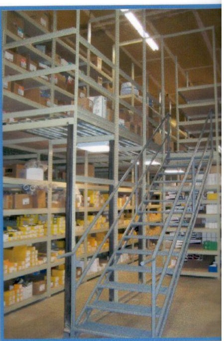 Stair access and shelving at the CED Royal Ogden mezzanine
